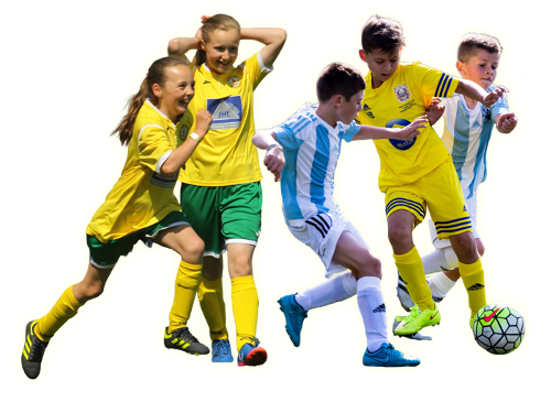 UK youth football tournament players in action — play on the pitch at a professional stadium